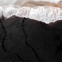 Meereswellen und Sandstrand