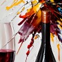 Glas Wein mit Weinflasche am Tisch