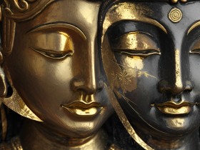 Goldene Buddha-Gesichter