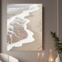 Sanfte Brandung am Sandstrand