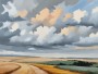 Dramatische Wolken über Feldern