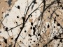 Abstrakte Farbspritzer in Beige und Schwarz