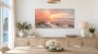 Sanfter Sonnenuntergang am Strand als Leinwand oder Poster